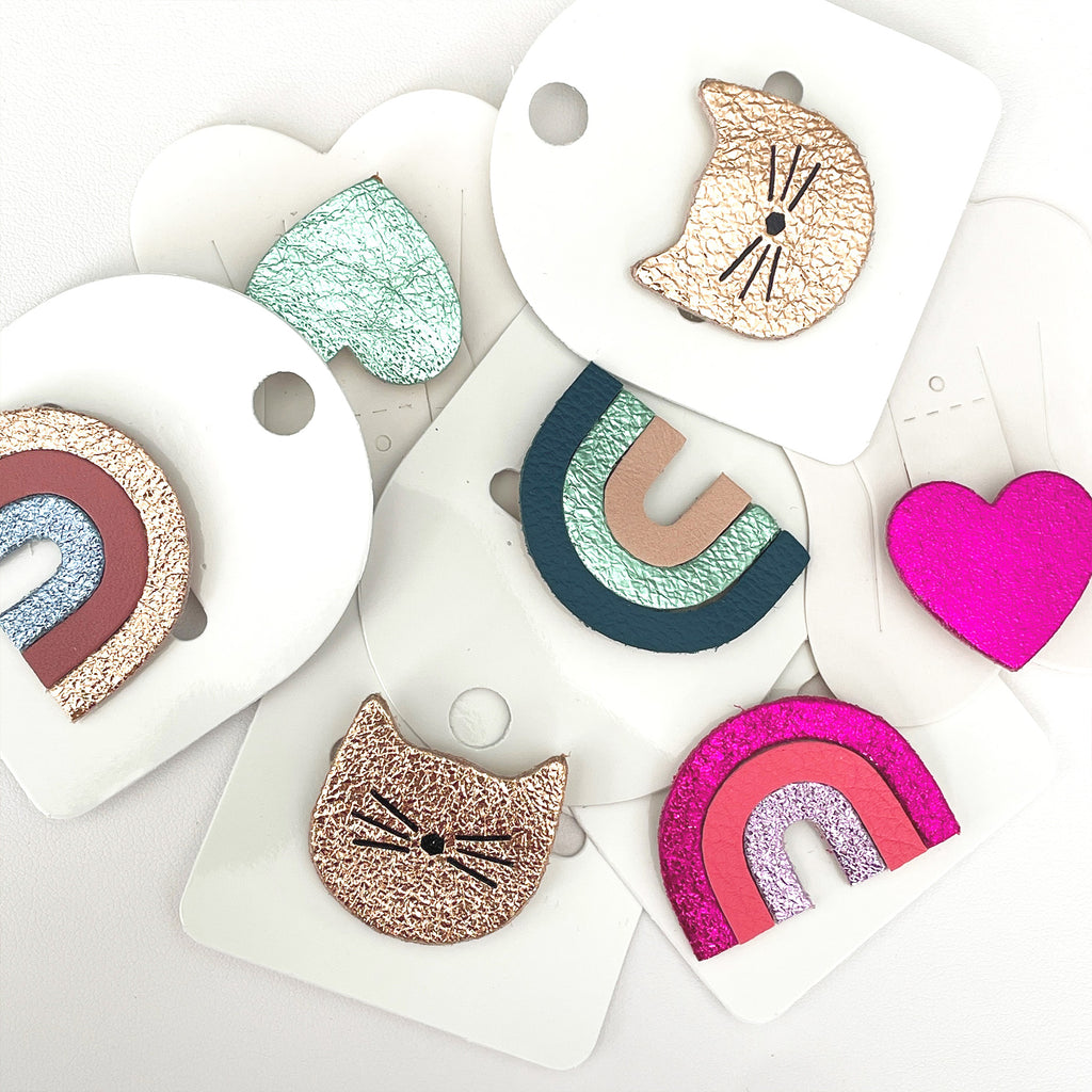 Cute leather brooches